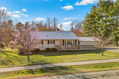 Charming, fully updated bungalow on just under 1/2 acre --