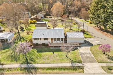 Charming, fully updated bungalow on just under 1/2 acre --