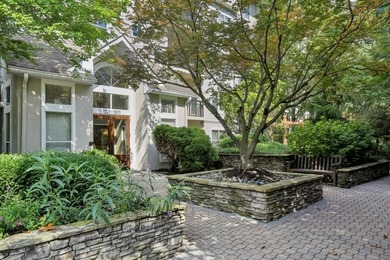 Welcome to this bright and inviting two-bedroom condo, ideally