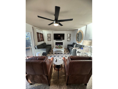Welcome to this stunning 3-bedroom, 3-bath waterfront home - photo 7