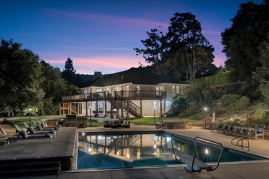 Welcome to 18803 Hilltop Way, a private gated estate nestled in - photo 2