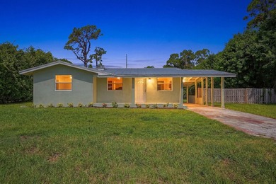 This charming single family home is tucked away in the back - photo 1