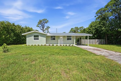 This charming single family home is tucked away in the back - photo 2