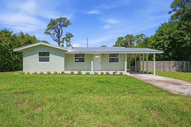 This charming single family home is tucked away in the back - photo 3