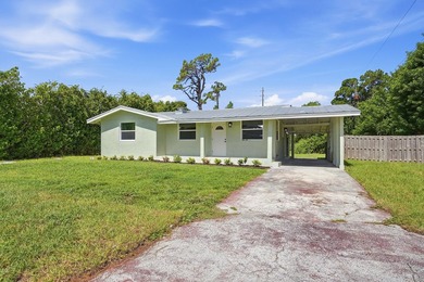 This charming single family home is tucked away in the back - photo 5