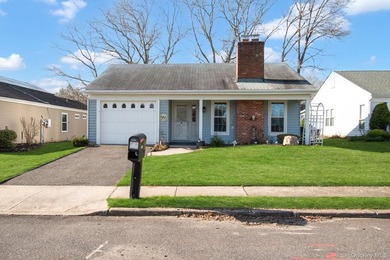 Welcome to easy, low-maintenance living in the highly desirable - photo 1