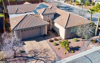 Experience refined Summerlin living in this beautifully