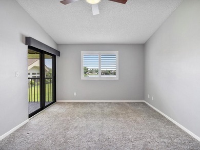 Beautifully renovated top-floor condo with serene lake views in - photo 11