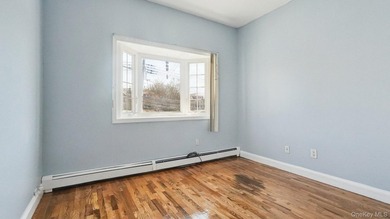 Welcome to this beautifully maintained two-family home in the - photo 13
