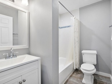 Beautifully renovated top-floor condo with serene lake views in - photo 14