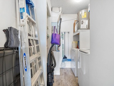 Beautifully renovated top-floor condo with serene lake views in - photo 16