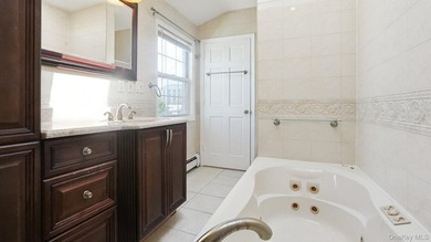 Welcome to this beautifully maintained two-family home in the - photo 20
