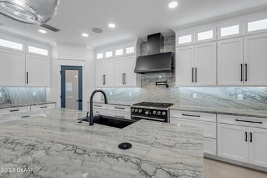 Experience the pinnacle of modern coastal luxury in this - photo 22