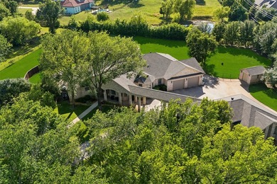 Tucked beneath a canopy of mature trees on two beautifully - photo 13
