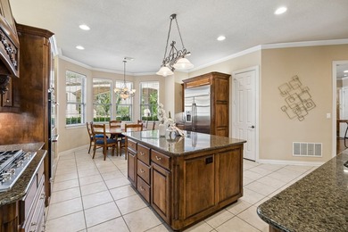 Tucked beneath a canopy of mature trees on two beautifully - photo 19