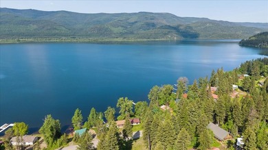 Discover the perfect lake retreat with this charming cabin on - photo 4