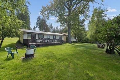 Discover the perfect lake retreat with this charming cabin on - photo 8