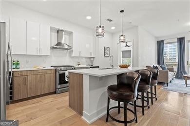 Better than new, this top-floor Midtown residence impresses with