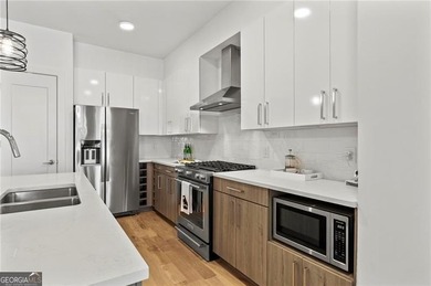 Better than new, this top-floor Midtown residence impresses with