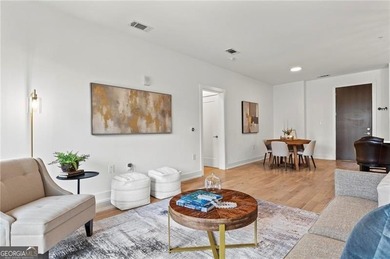 Better than new, this top-floor Midtown residence impresses with