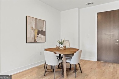 Better than new, this top-floor Midtown residence impresses with