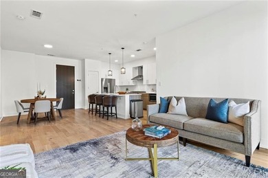 Better than new, this top-floor Midtown residence impresses with