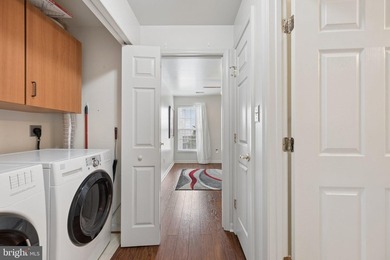 Welcome home to this beautifully maintained top-floor - photo 33