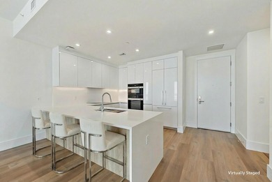 Perched on the 15th floor, this brand-new waterfront residence - photo 12