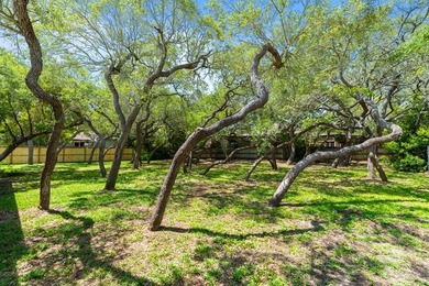 Nestled beneath sprawling oak trees on two generously sized lots - photo 14