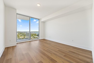 Perched on the 15th floor, this brand-new waterfront residence - photo 15