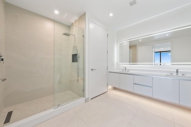 Perched on the 15th floor, this brand-new waterfront residence - photo 17