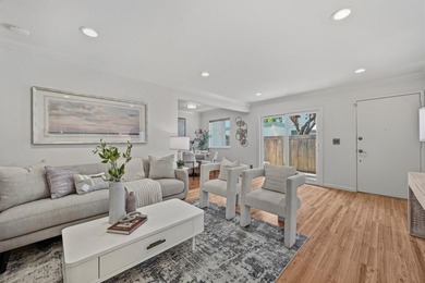 Welcome home to this beautifully updated townhome nestled in a - photo 1