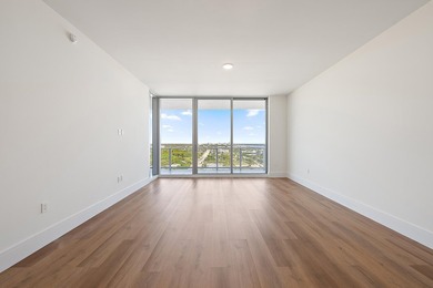 Perched on the 15th floor, this brand-new waterfront residence - photo 23