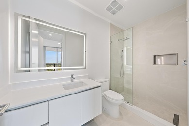 Perched on the 15th floor, this brand-new waterfront residence - photo 24