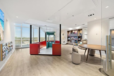 Perched on the 15th floor, this brand-new waterfront residence - photo 28