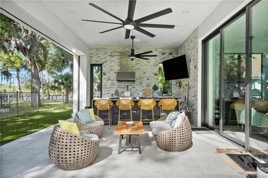 Experience modern waterfront luxury in this stunning - photo 5