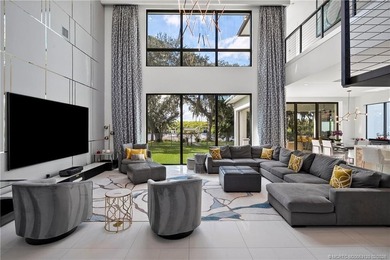 Experience modern waterfront luxury in this stunning - photo 6