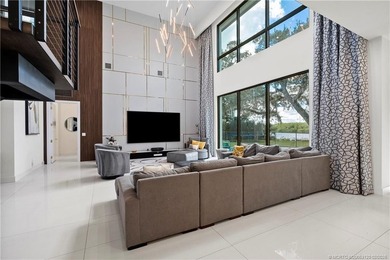 Experience modern waterfront luxury in this stunning - photo 8