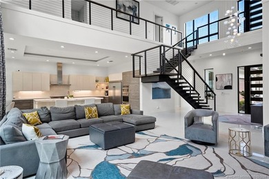Experience modern waterfront luxury in this stunning - photo 10