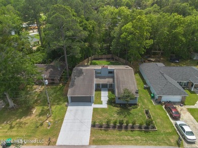 Adorable home in Diamondhead featuring stainless steel - photo 2