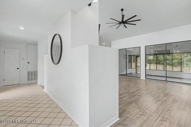 Adorable home in Diamondhead featuring stainless steel - photo 7