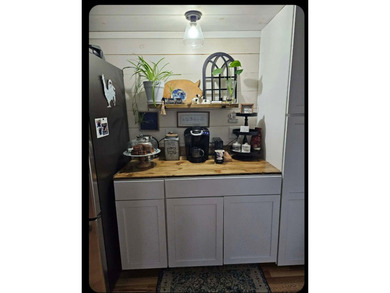 Nestled in a peaceful, private setting, this charming home - photo 15