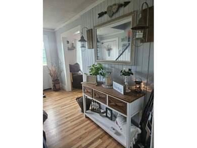 Nestled in a peaceful, private setting, this charming home - photo 20