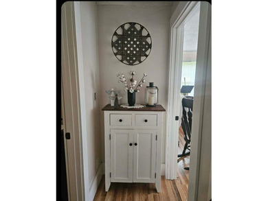 Nestled in a peaceful, private setting, this charming home - photo 23