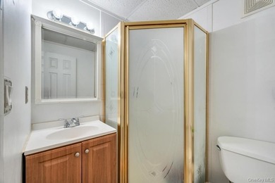 Welcome to 32 Beverly Street in Islip, a spacious Colonial - photo 24