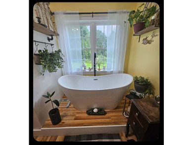Nestled in a peaceful, private setting, this charming home - photo 25