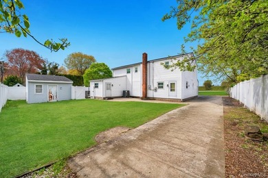 Welcome to 32 Beverly Street in Islip, a spacious Colonial - photo 27