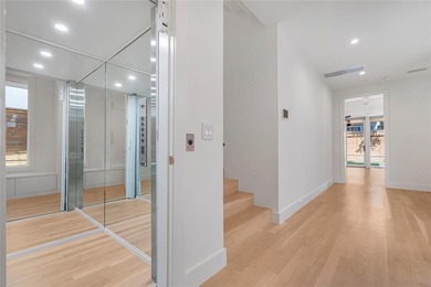 Discover an exquisite three-story modern home in Northern Hills