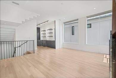 Discover an exquisite three-story modern home in Northern Hills