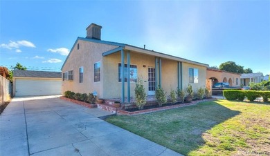 Charming North Long Beach bungalow with great bones and room to - photo 1